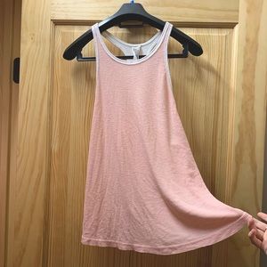 Very flowy Free People tank. A peachy pink color and lightly see-through.
